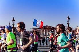 Image shows runners in the Paris Marathon.