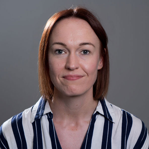 Professional portrait of Lucy Dean, physiotherapist.