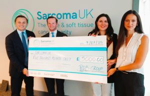 Photo of the Cheque Presentation.  Pictured is (from left) Jake, James Turvey and Federica Bambagioni of BDB with Greis Kula, Sarcoma UK’s Corporate and Special Events Officer.