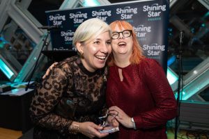 Nicola Crowson receives her award from Angela Barnes