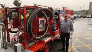 Greville Marchant and his Japanese fire engine